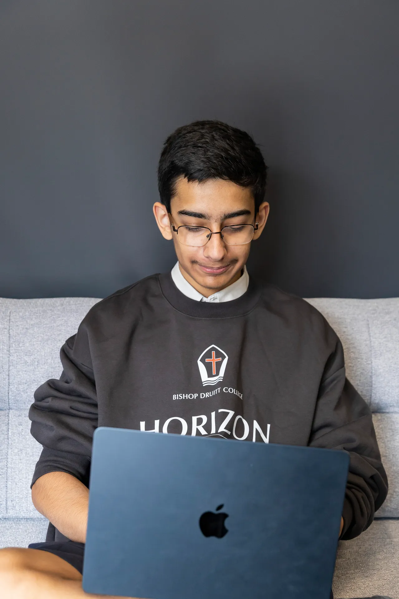 Student engaged in a home-based education program designed to support academic growth.