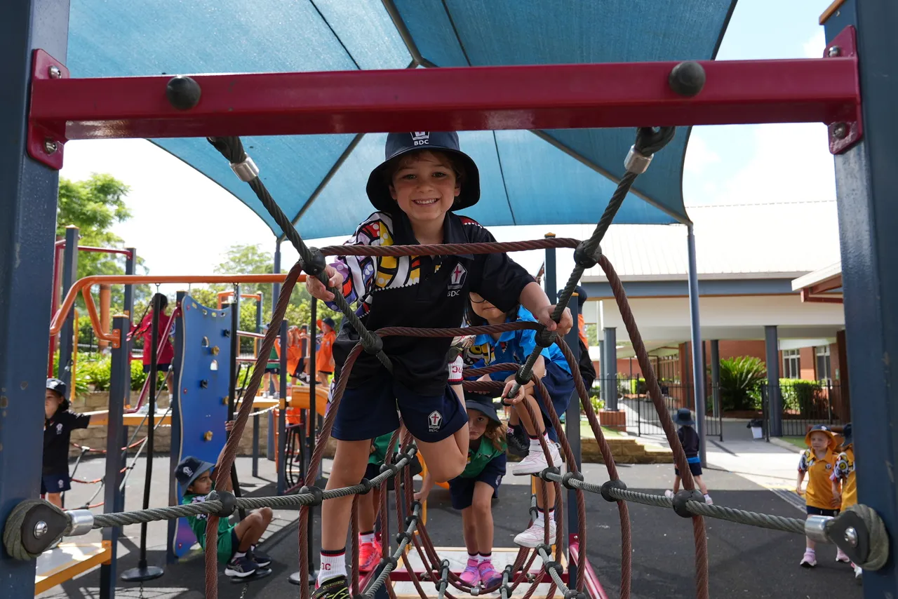 kindergarten-students-interacting-in-outdoor-play-area-bdc