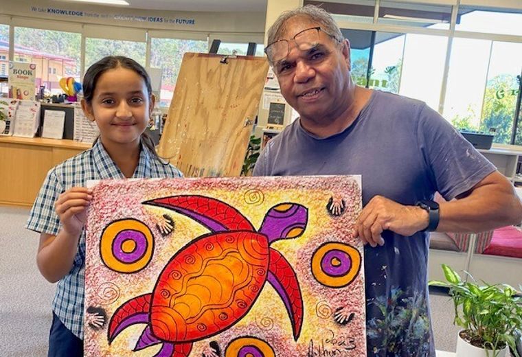 Arthur Conlon visit, showing art with a student