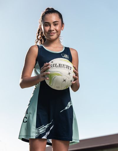 Netball player holding the ball