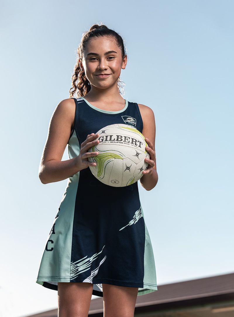 Netball player holding the ball