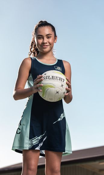 Netball player holding the ball