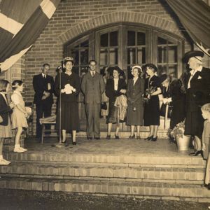 Coming of age (21 years) celebrations in on the steps of the Boarding House in 1948