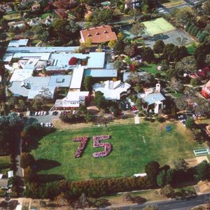 Students in formation on Hargrave Oval to celebrate the School's 75th Anniversary