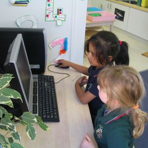 Young ELC students using technology within the centre
