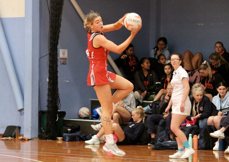 High school student playing sport.