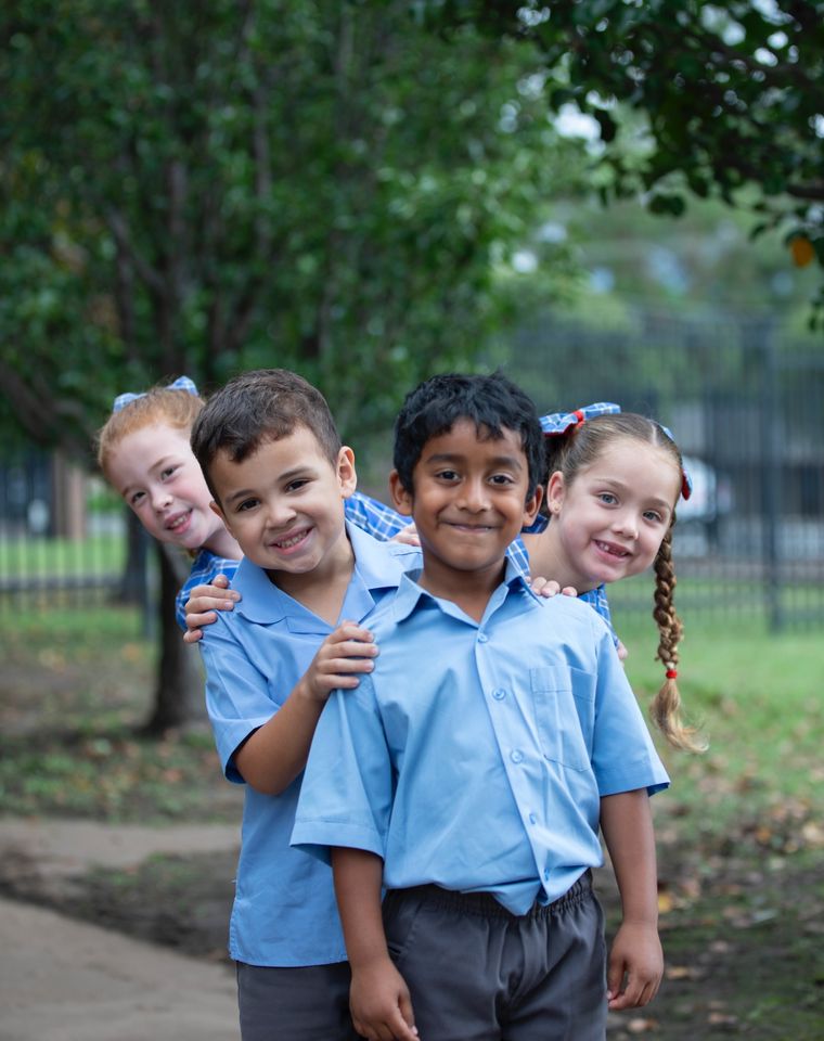 Primary school students outdoors.