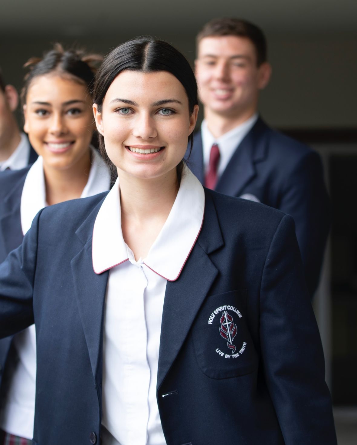 High school student smiling at camera.