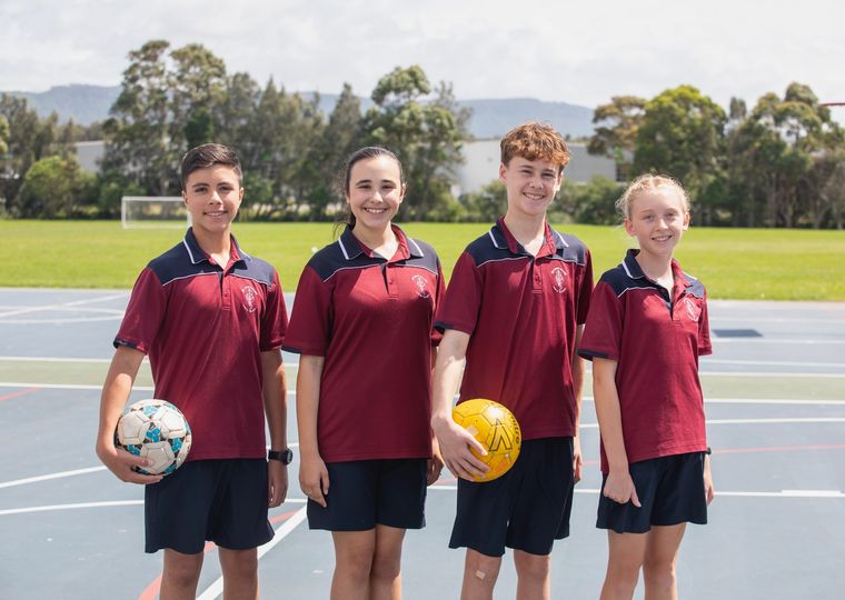 High school students with sports equipment.