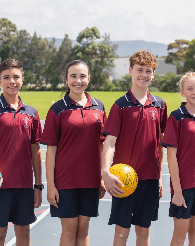 High school students with sports equipment.