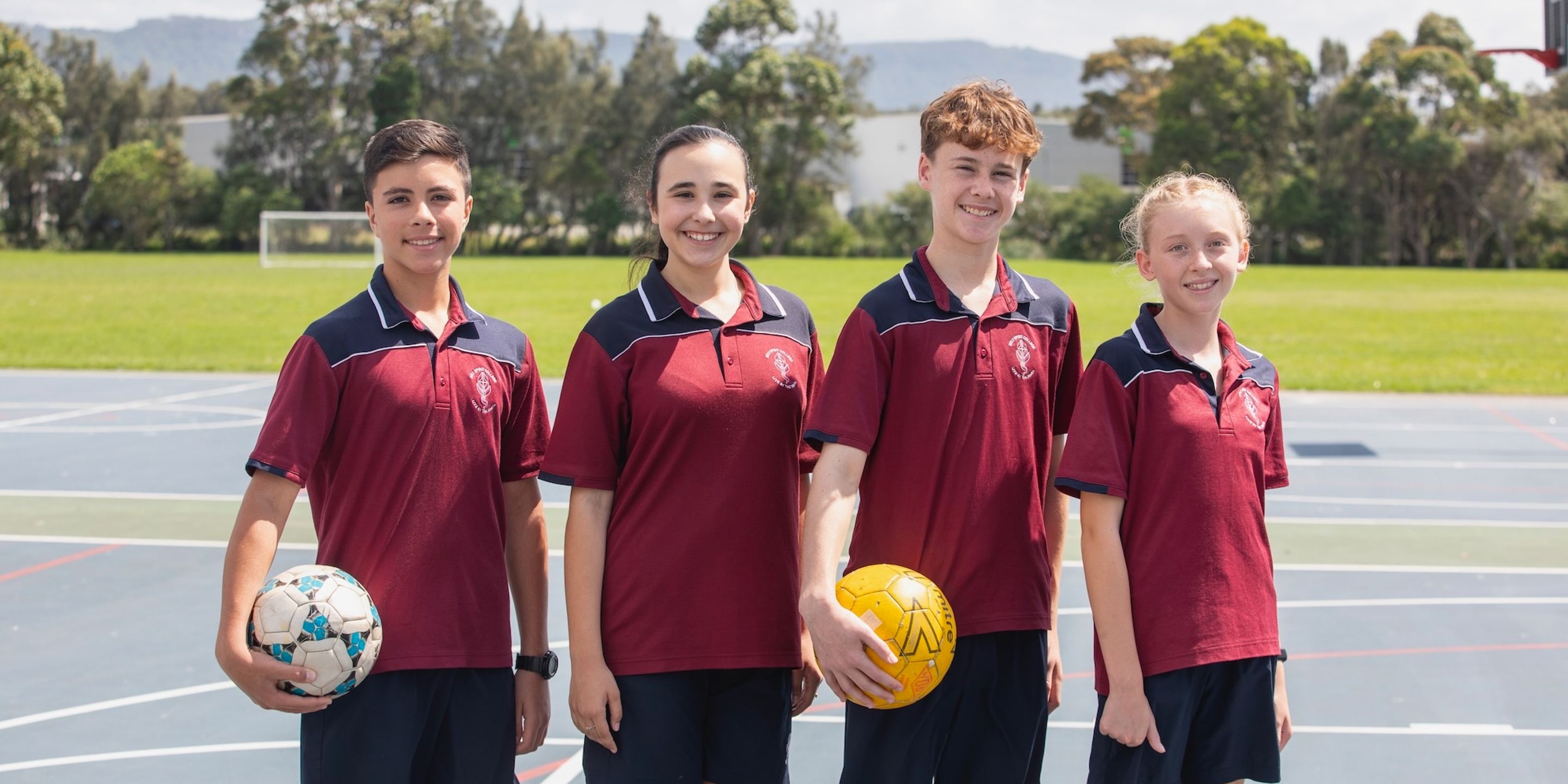 High school students with sports equipment.