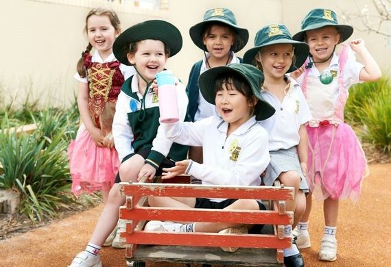 students playing in wagon