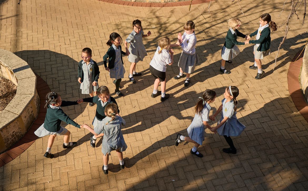 Penrhos Junior School students playing together in courtyard