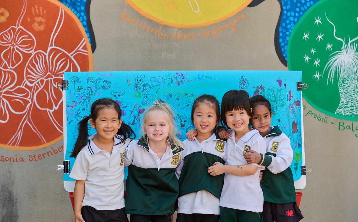 Penrhos ELC students group with their artwork