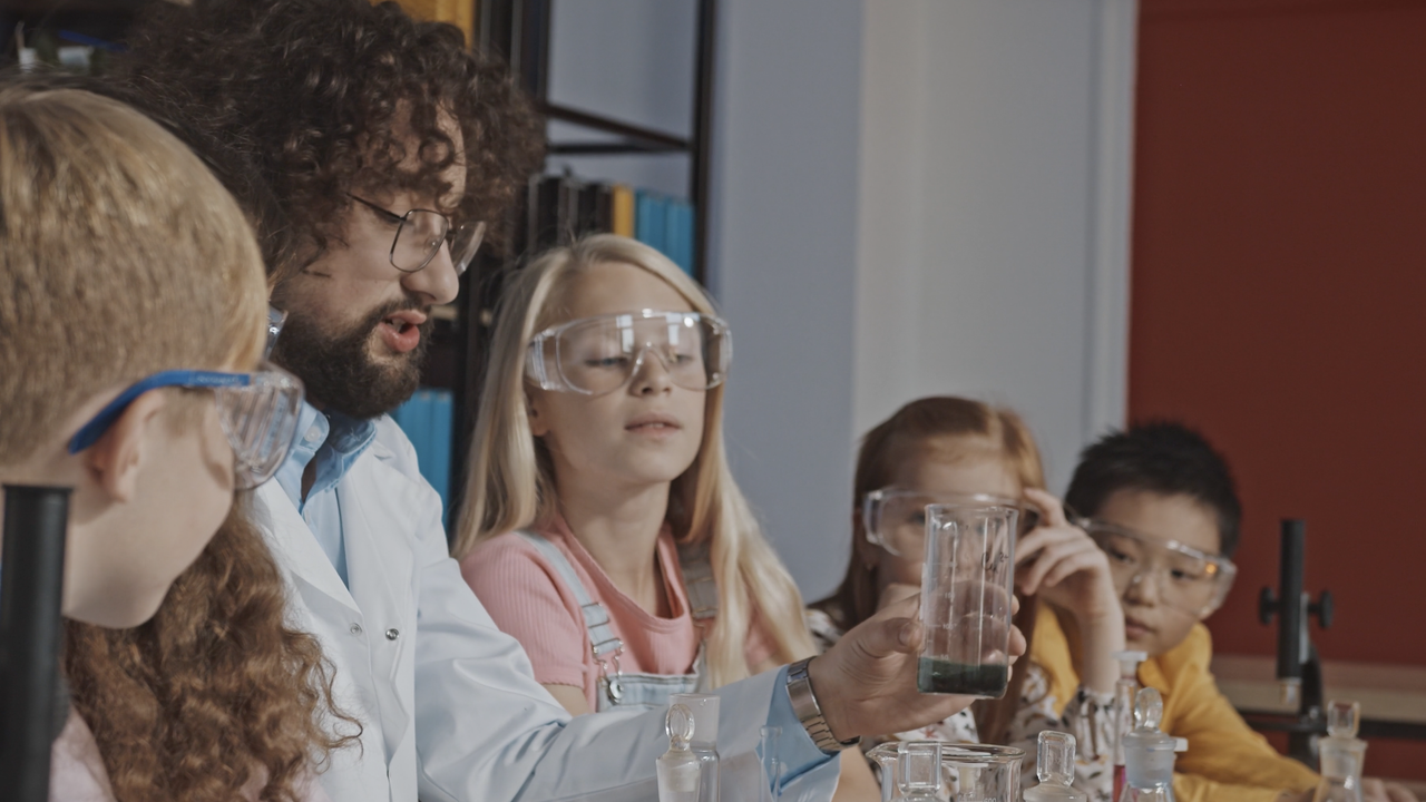 Our students learning about chemical reactions in science class to prepare for their science fair projects