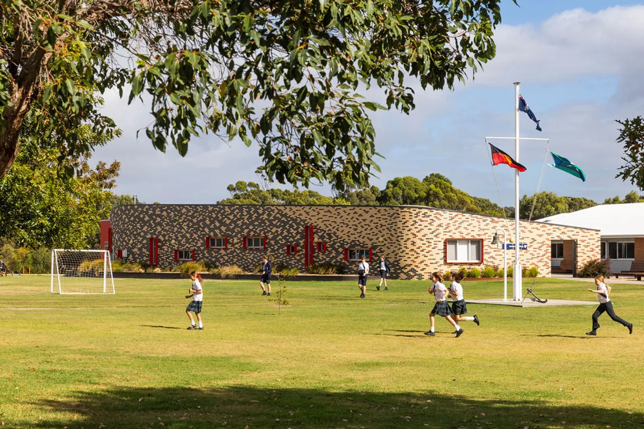 Students running on main oval.