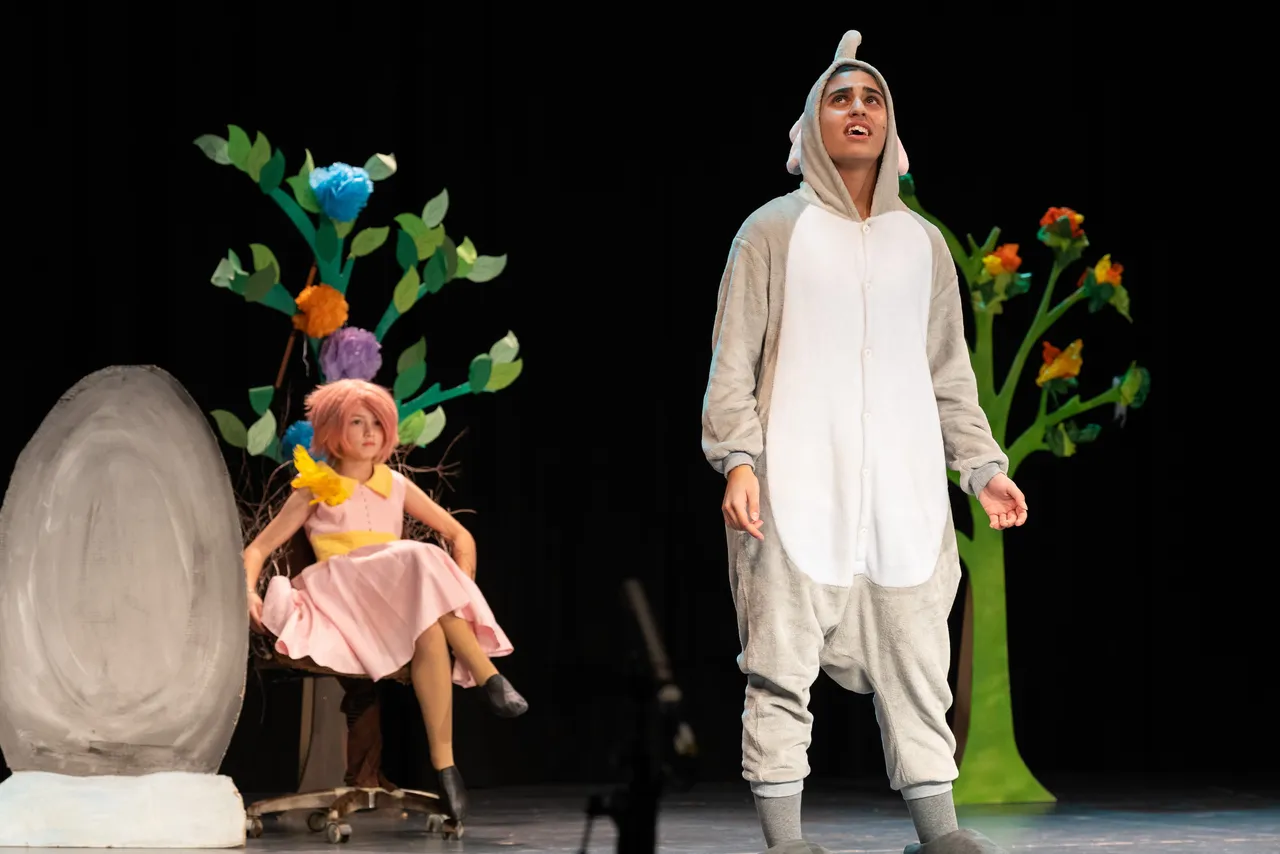 Two upper primary school aged students in costume captured mid-performance during the Middle School Year 5 & 6 Musical Season 1 production of Seussical KIDS.