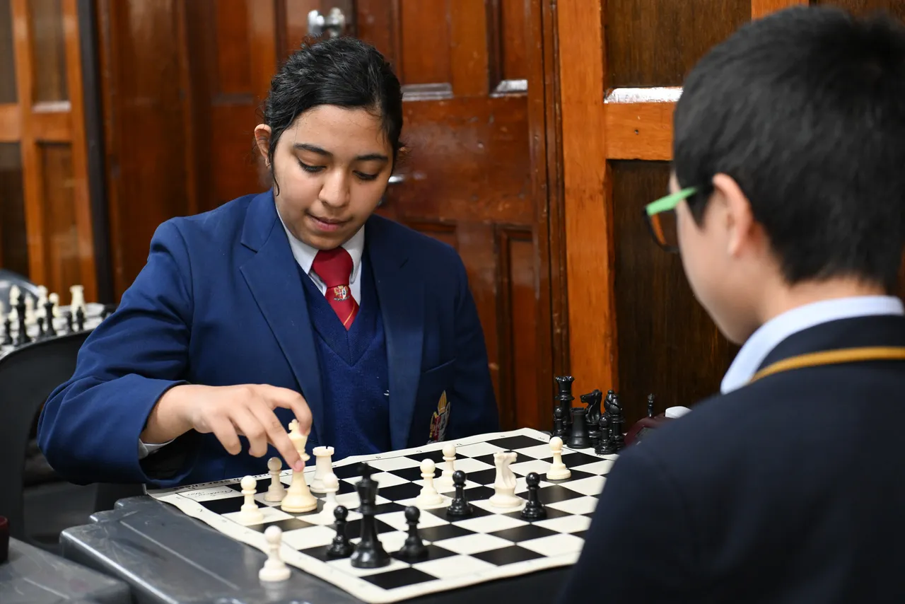 Secondary school aged student playing Chess as part of the ACS Chess Championship 2026.