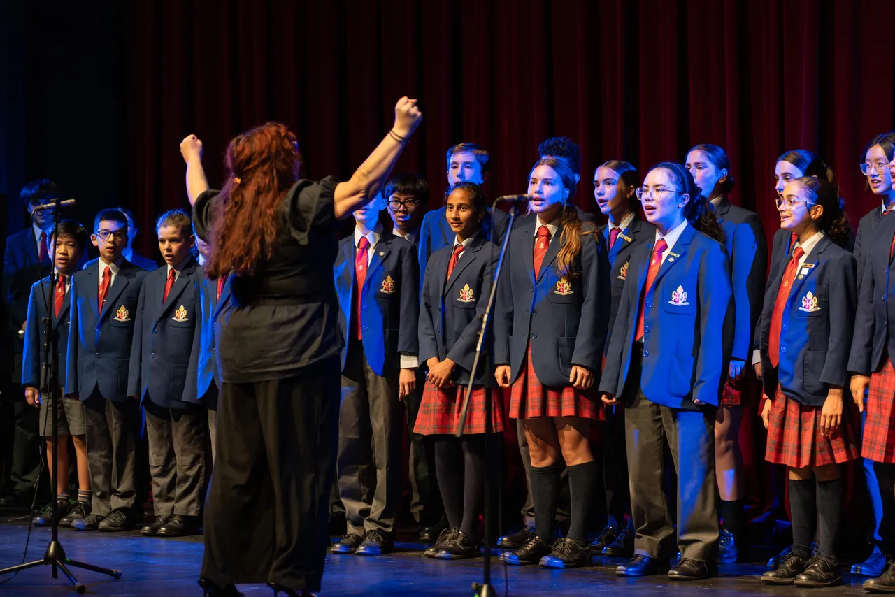 Lower and middle secondary school aged Performing Arts students singing in the Middle School Choir at Overnewton's annual Come Together 2026 concert held at the Clocktower Centre, Moonee Ponds.