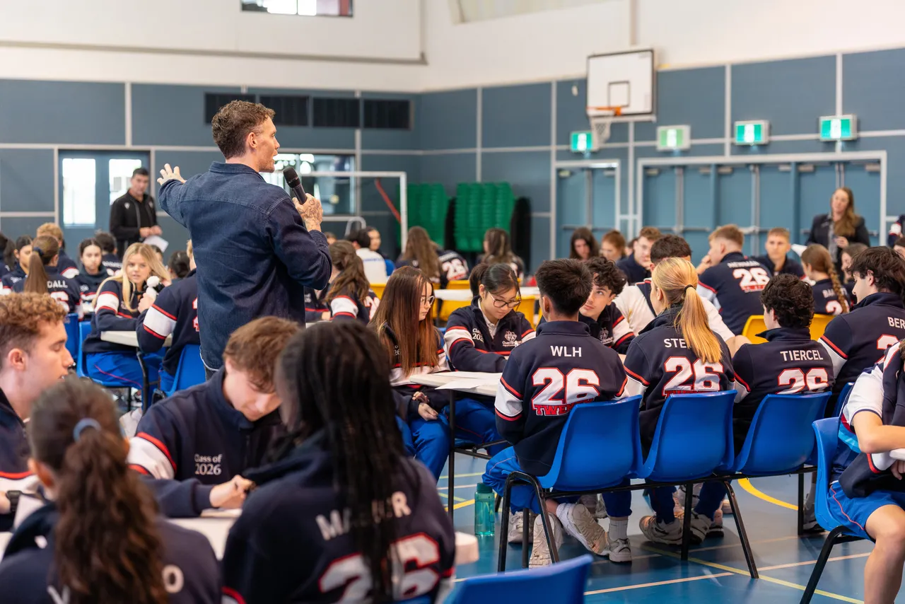 Facilitator Nick Orchard presents to a large group of Year 12 students during "The Big Refresh" pastoral care incursion which focused on how to identify burnout, held at Yirramboi Campus, Keilor.