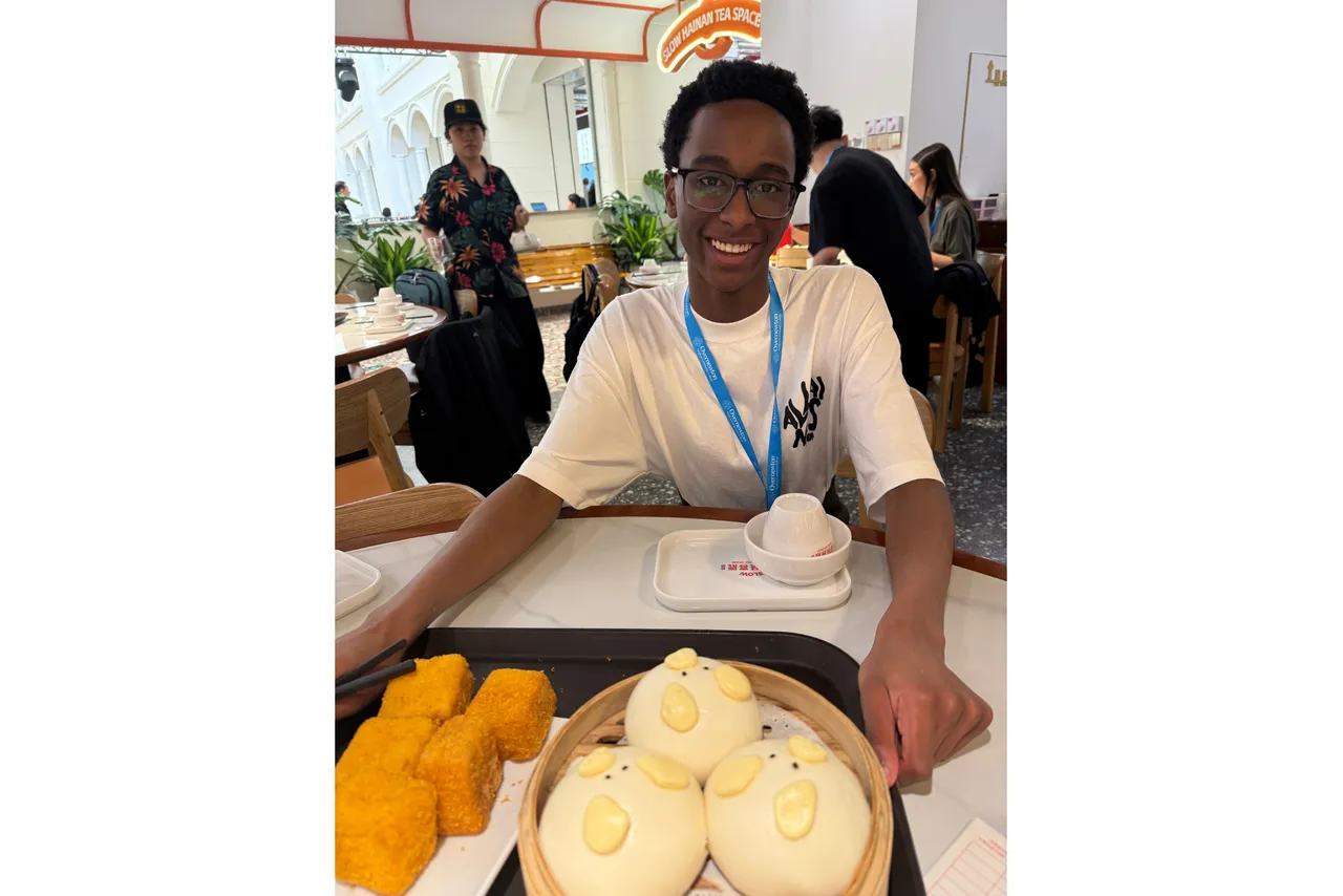 Upper secondary school aged student enjoying a yum cha meal at a traditional restaurant in Hainan as part of Overnewton's 2025 educational travel tour to China.
