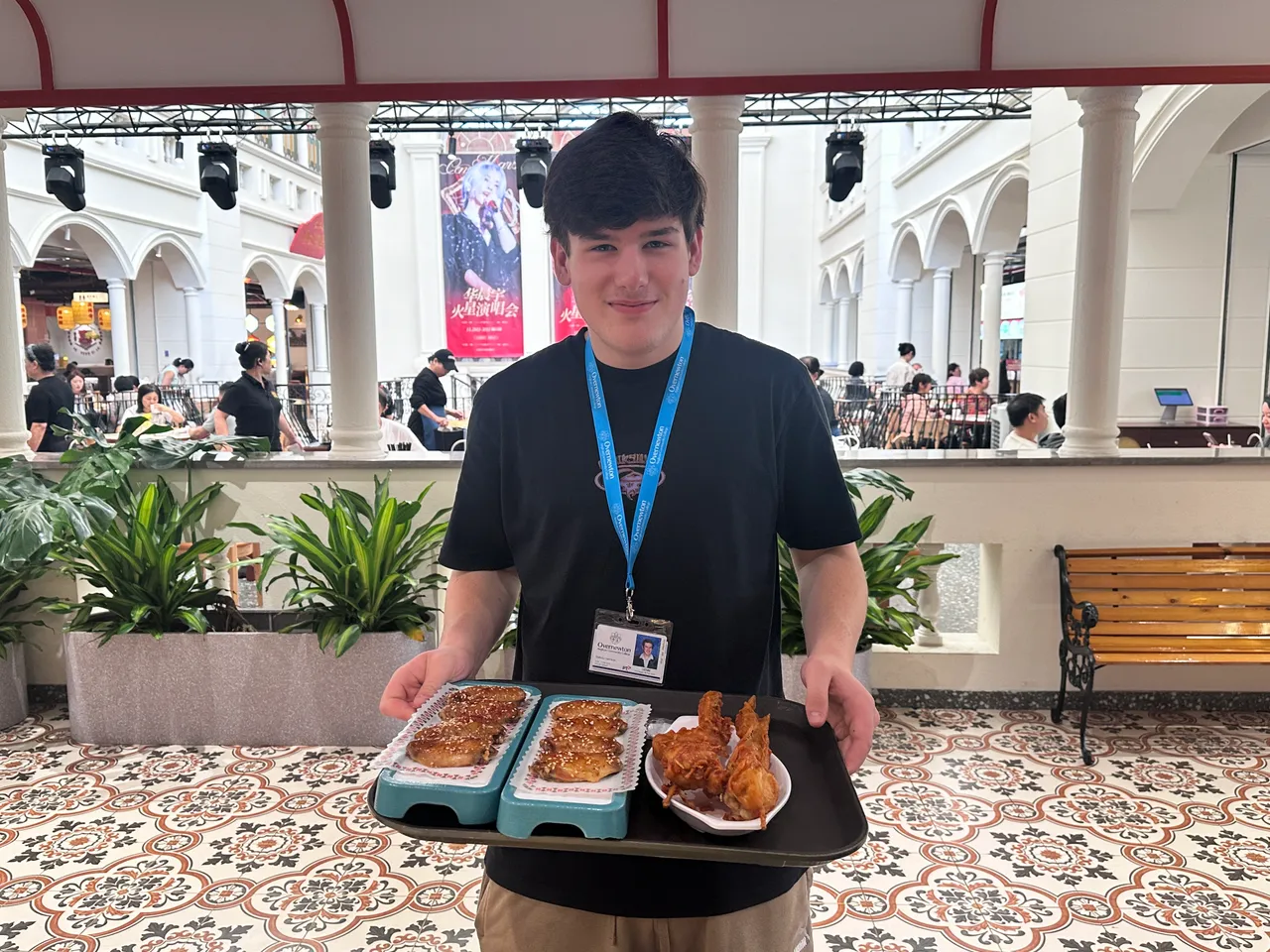 Upper secondary school aged student enjoying a yum cha meal at a traditional restaurant in Hainan as part of Overnewton's 2025 educational travel tour to China.