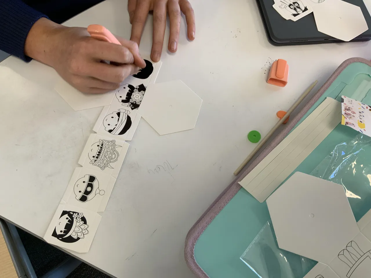 Upper primary school-aged student from Middle School colouring Chinese characters during Overnewton’s 2025 Languages and Culture Week.