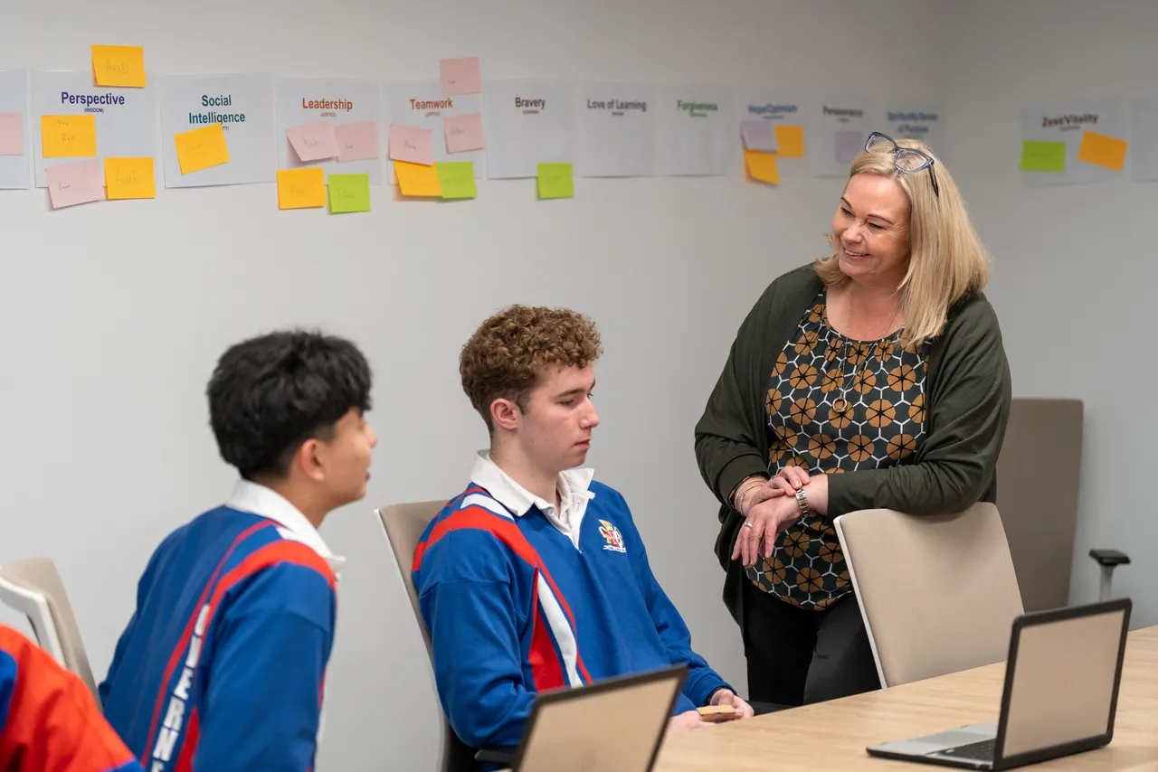 Year 12 Student Executive members in discussion with Overnewton Principal Emily FitzSimons during a Student Leadership Workshop.
