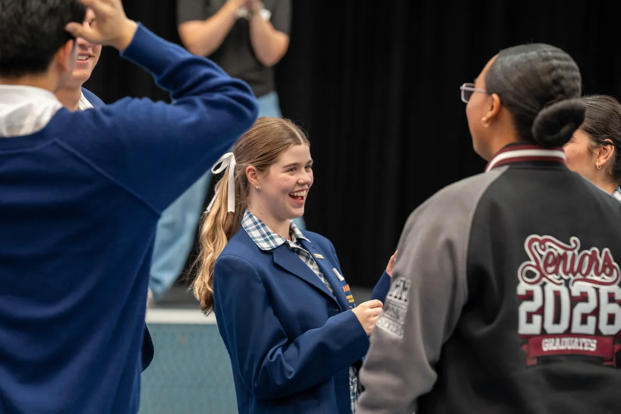 Upper secondary school aged students from various schools in Melbourne's North West working collaboratively on a student leadership learning task at Overnewton's third annual Student Leadership Summit.