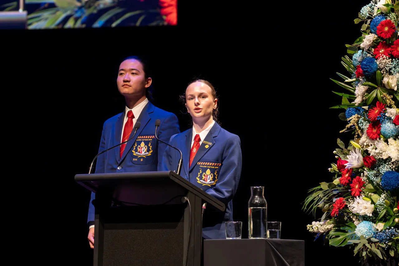 2025 College Captains, Charlie O'Sullivan and Nathan Yuan, speaking to the audience at Hamer Hall during Overnewton’s 2025 Presentation Night.