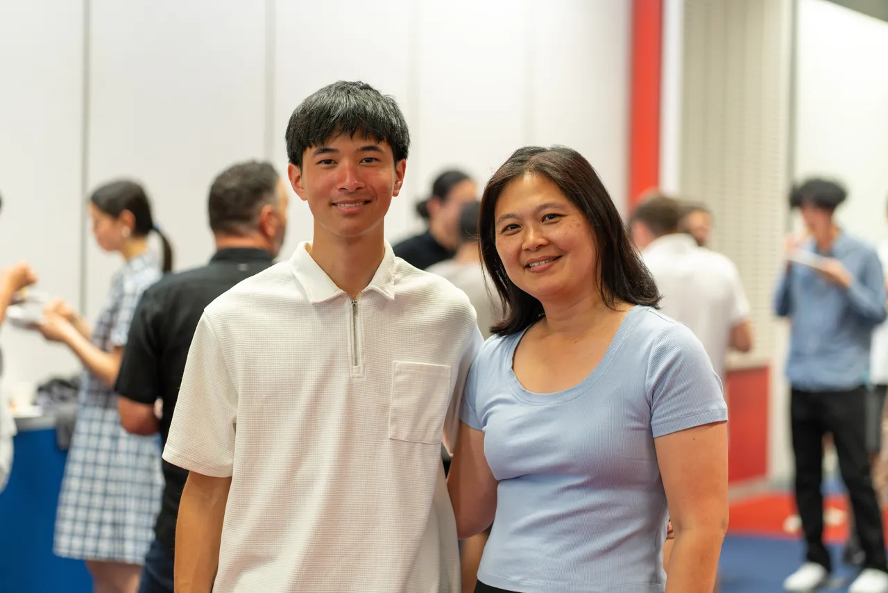 Photo of Class of 2026 student Coen Lim with his mother, at the luncheon event that followed Overnewton's Class of 2025 VCE Awards Assembly.