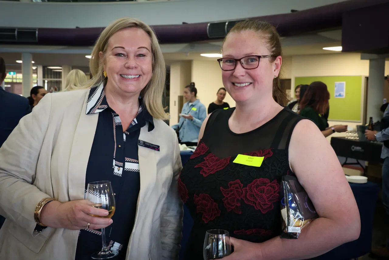Principal, Emily FitzSimons, and Overnewton Community Engagement Program parent volunteer enjoy a celebratory drink during Overnewton's inaugural Volunteer Appreciation Event, held at the Yirramboi Campus, Keilor.