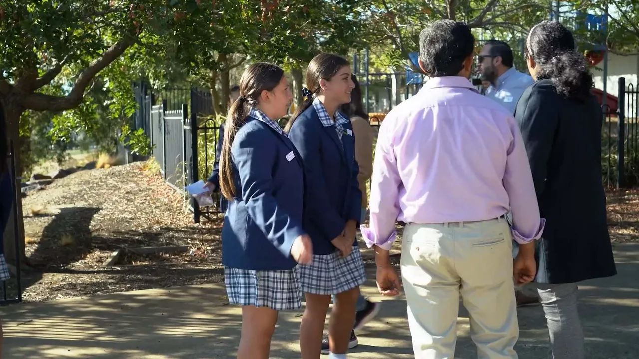 Year 8 students hosting a potential Overnewton family at School Alive tour of the Middle and Senior Schools, located at Yirramboi Campus, Keilor.