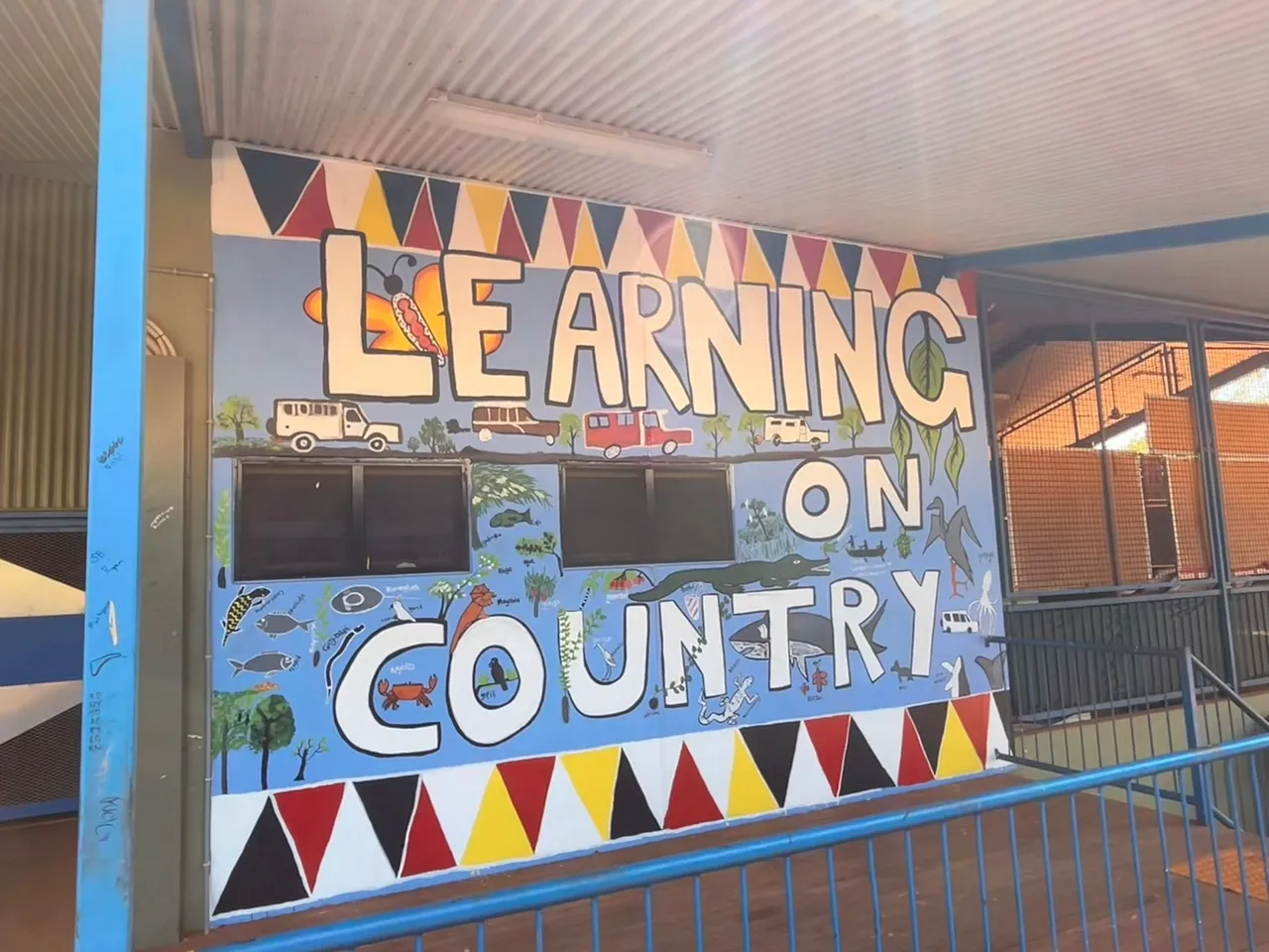 Hand-painted “Learning on Country” sign displayed at Shepherdson College, Overnewton’s sister school in Galiwin’ku on Elcho Island, Northern Territory.