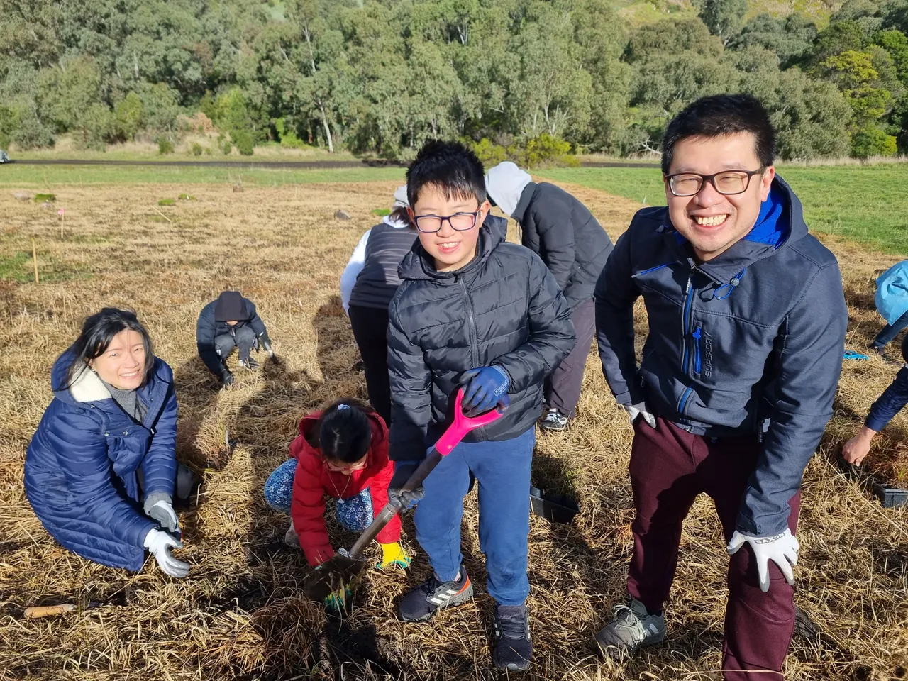 A family participating in a Clean Up Australia Day activity in the local Keilor area, contributing to Overnewton's Parent Sustainability Group initiatives focused on environmental stewardship and community engagement.