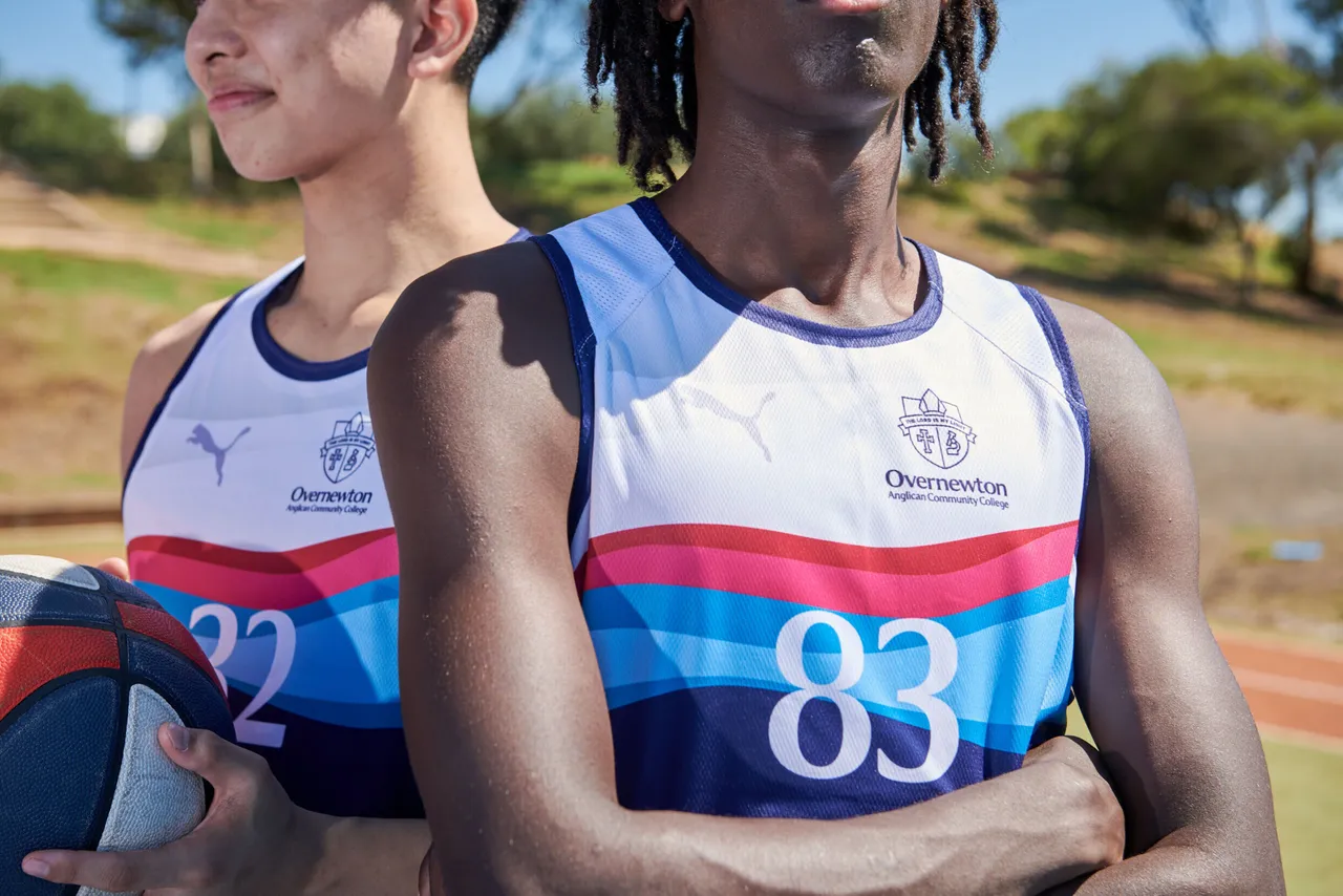 Senior secondary school aged students wearing the new Overnewton Competitive Sportswear basketball tops.