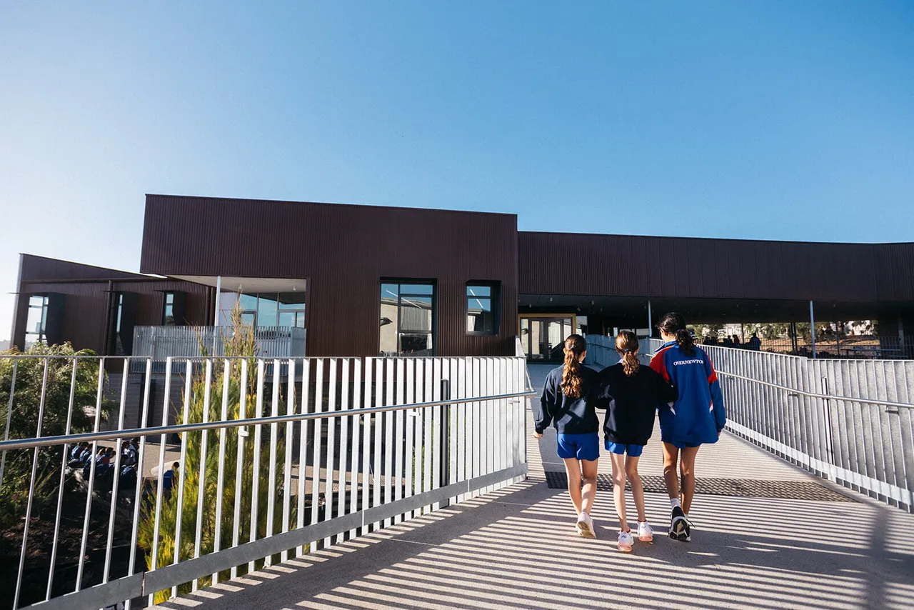 Middle School students crossing the bridge to the award-winning Middle School building at Yirramboi Campus.