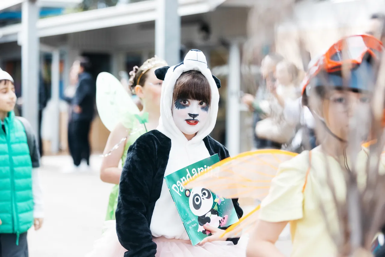 Middle primary school aged student dressed as a beloved storybook character, proudly taking part in Overnewton’s annual Junior School Book Week Parade - a celebration of imagination and the joy of reading.