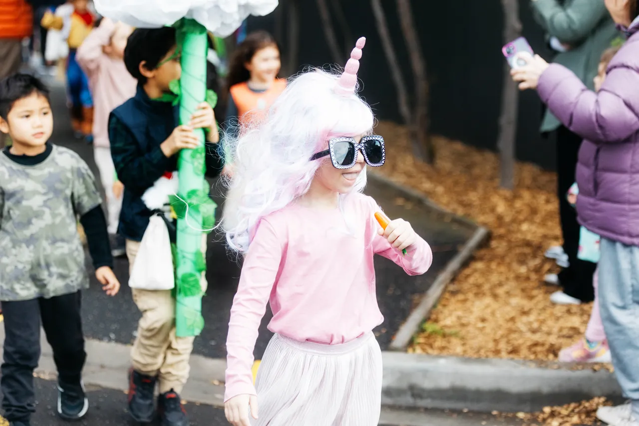 Lower primary school aged student dressed as a beloved storybook character, proudly taking part in Overnewton’s annual Junior School Book Week Parade - a celebration of imagination and the joy of reading.