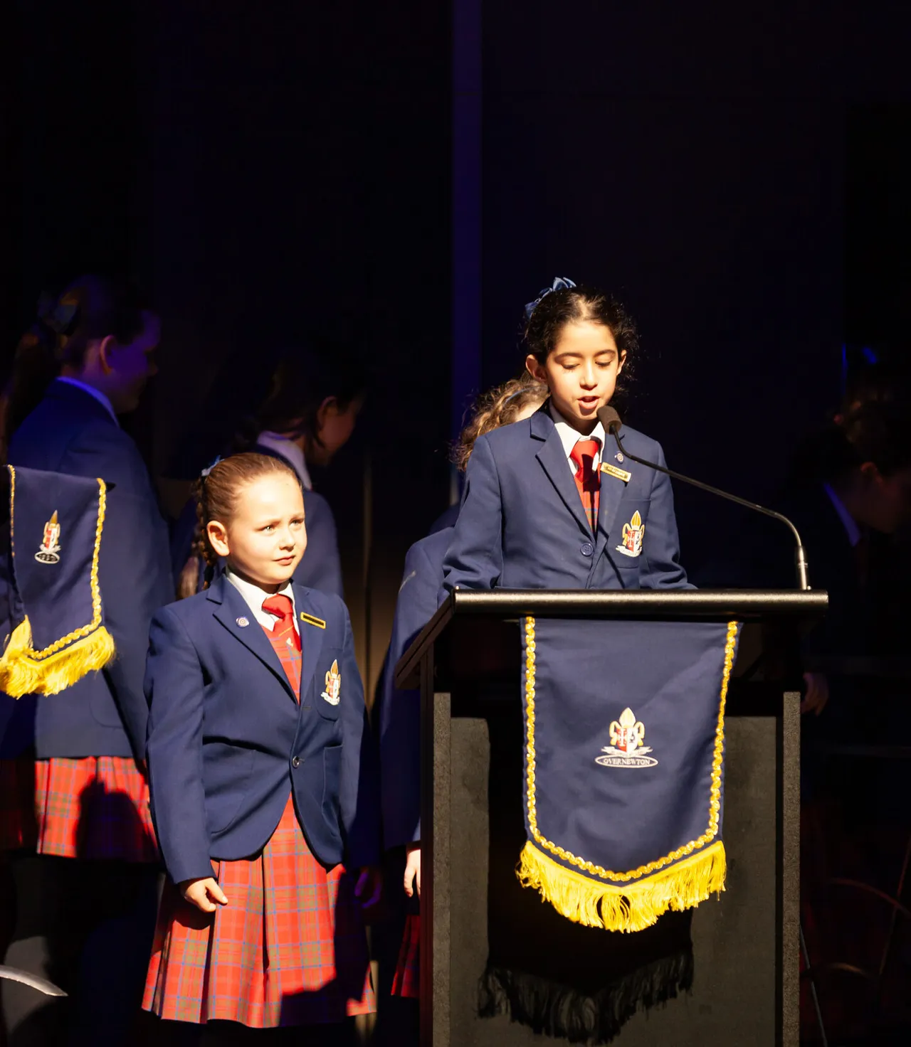 Upper primary school aged students participating in public speaking as part of Overnewton’s Be Heard co-curricular program, building confidence, communication, and public speaking skills.