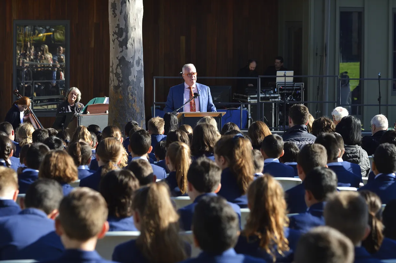 Principal addressing a large crowd gathered for the official opening of the Prep to Year 2 building at Canowindra Campus, celebrating a key milestone in Overnewton’s growth and early years education.