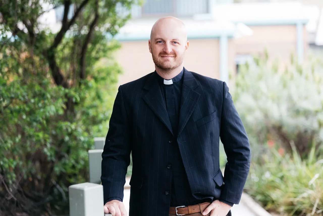 Headshot of Reverend Peter Landry, representing his role in the spiritual life of the Overnewton community.