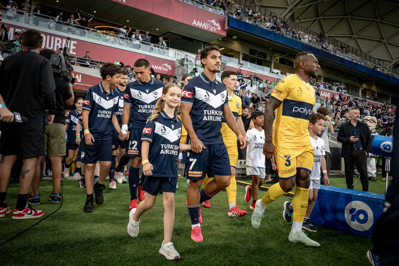 Primary and lower secondary school aged students enjoying an exclusive on-field experience with Melbourne Victory players, as part of Overnewton’s partnership as the first and exclusive football partner school of Melbourne Victory Football Club.