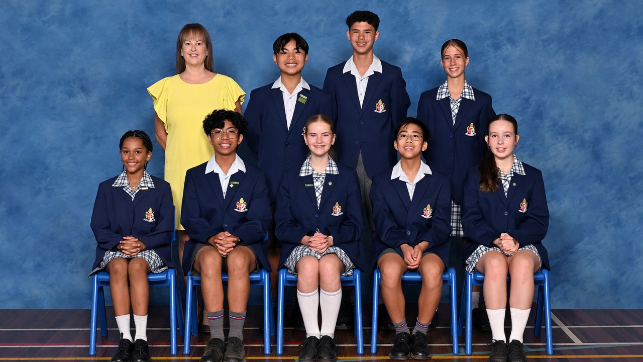 Formal photo of the Middle School Student Representative Council for 2025 with the Head of Middle School, Ms Jodi Fitzgerald-Tate.