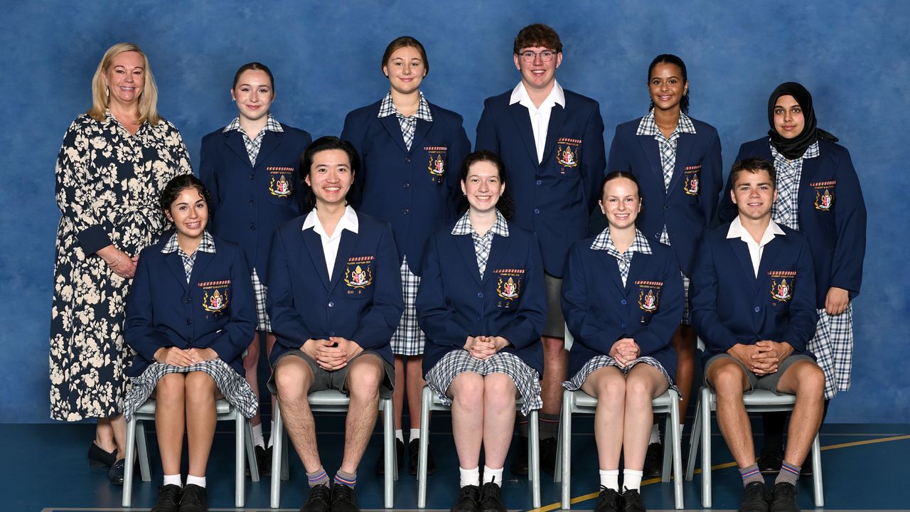 Principal Emily FitzSimons pictured in a formal school photograph alongside the 2025 Student Executive - a group of senior secondary school aged students representing student leadership at Overnewton.