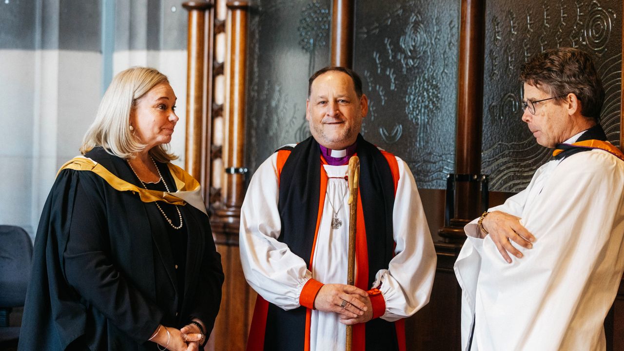 Members of the clergy in quiet conversation with the Principal at St Paul’s Cathedral following a Founders Day Service, reflecting a moment of connection and shared purpose within the Overnewton community.