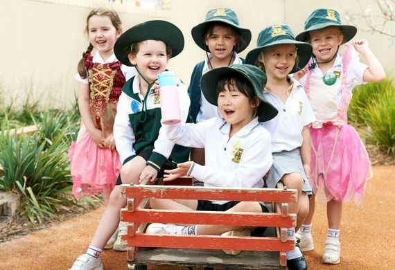 students playing in wagon