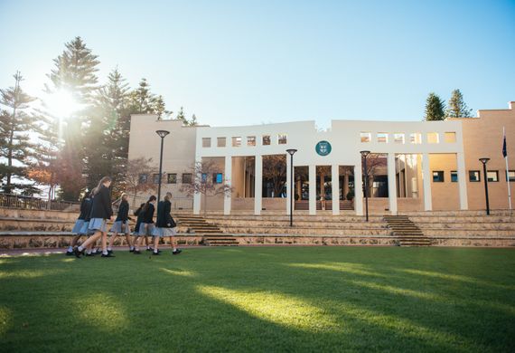 students walking on grass