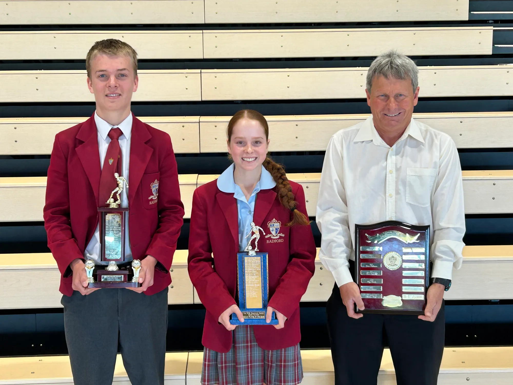 Football award recipients Michael, Loretta and Mr Andrew Forester.
