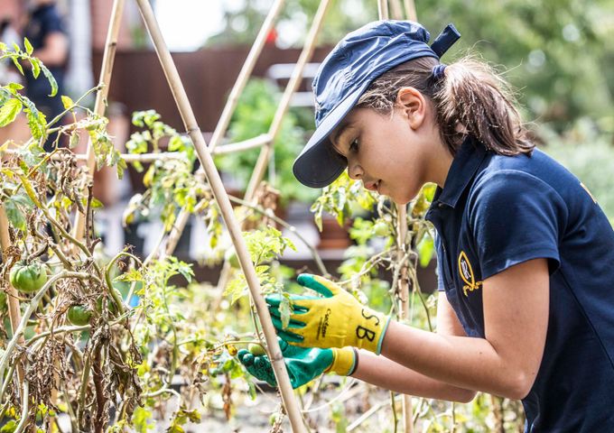 A Ruyton student working in the garden at South House